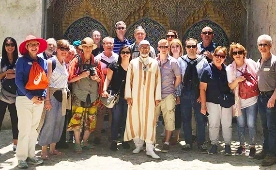 Group of happy tourists
